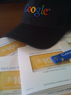 10 AdWords golden coupons, plus another Google hat by gravel72 on Flickr